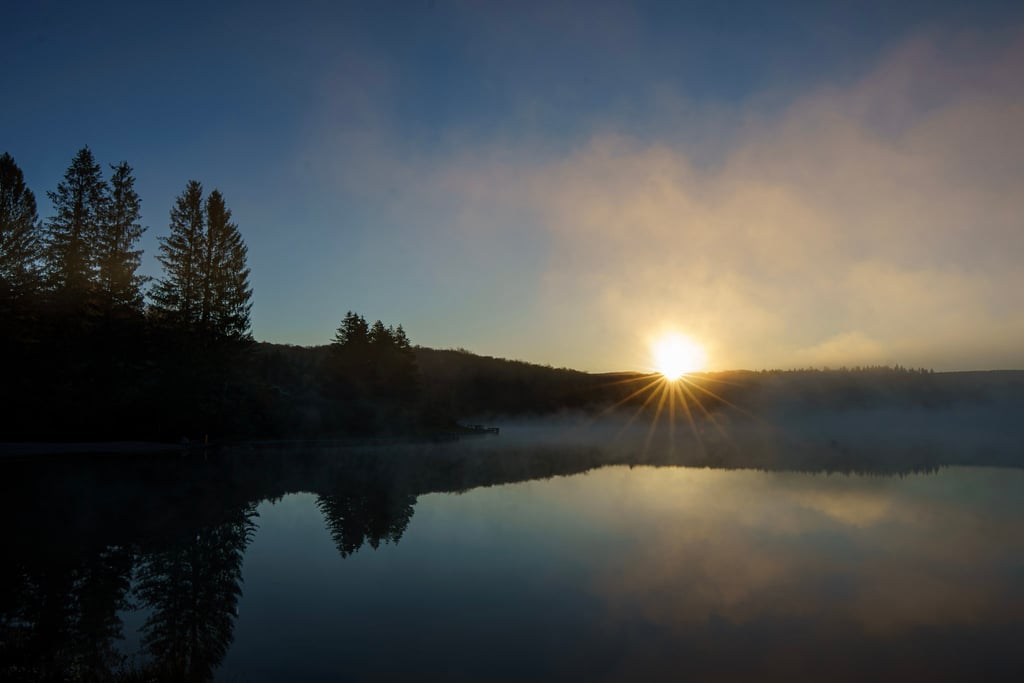 misty lake sunrise